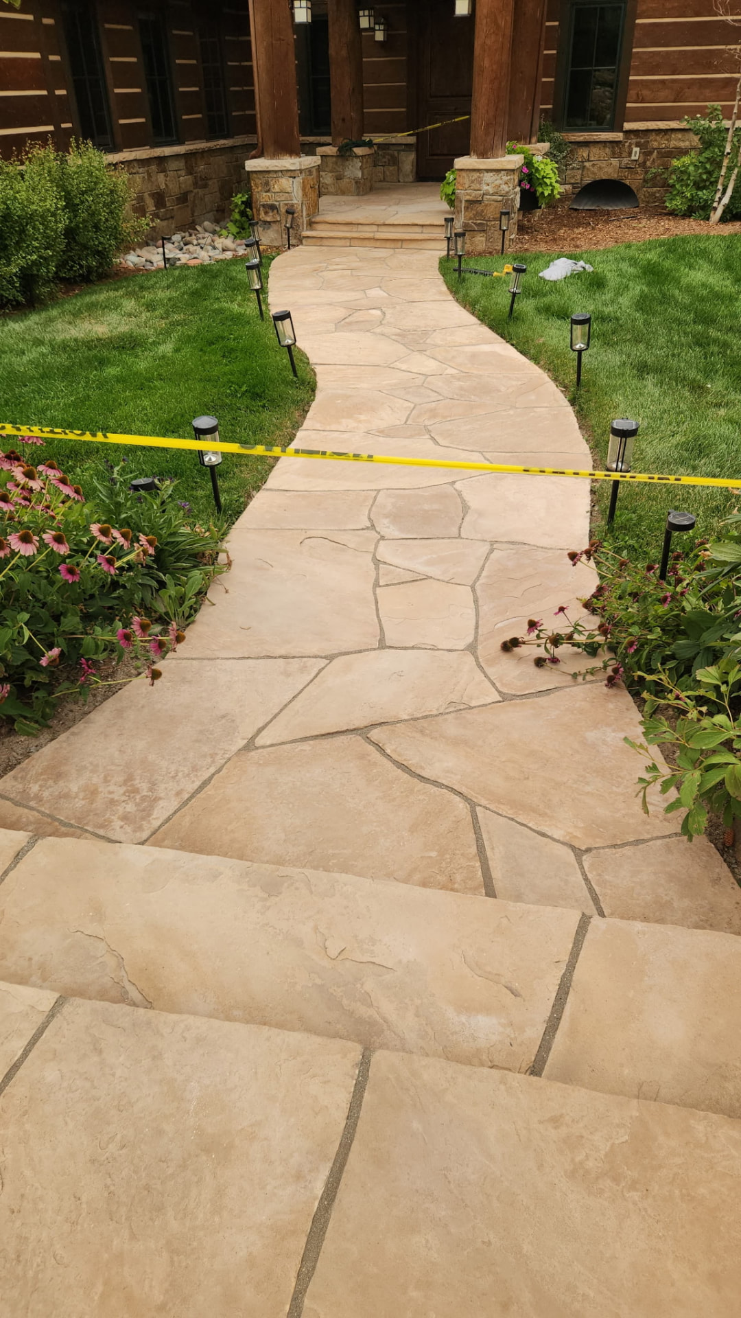 Finished sealed stamped-concrete walkway at a Colorado home