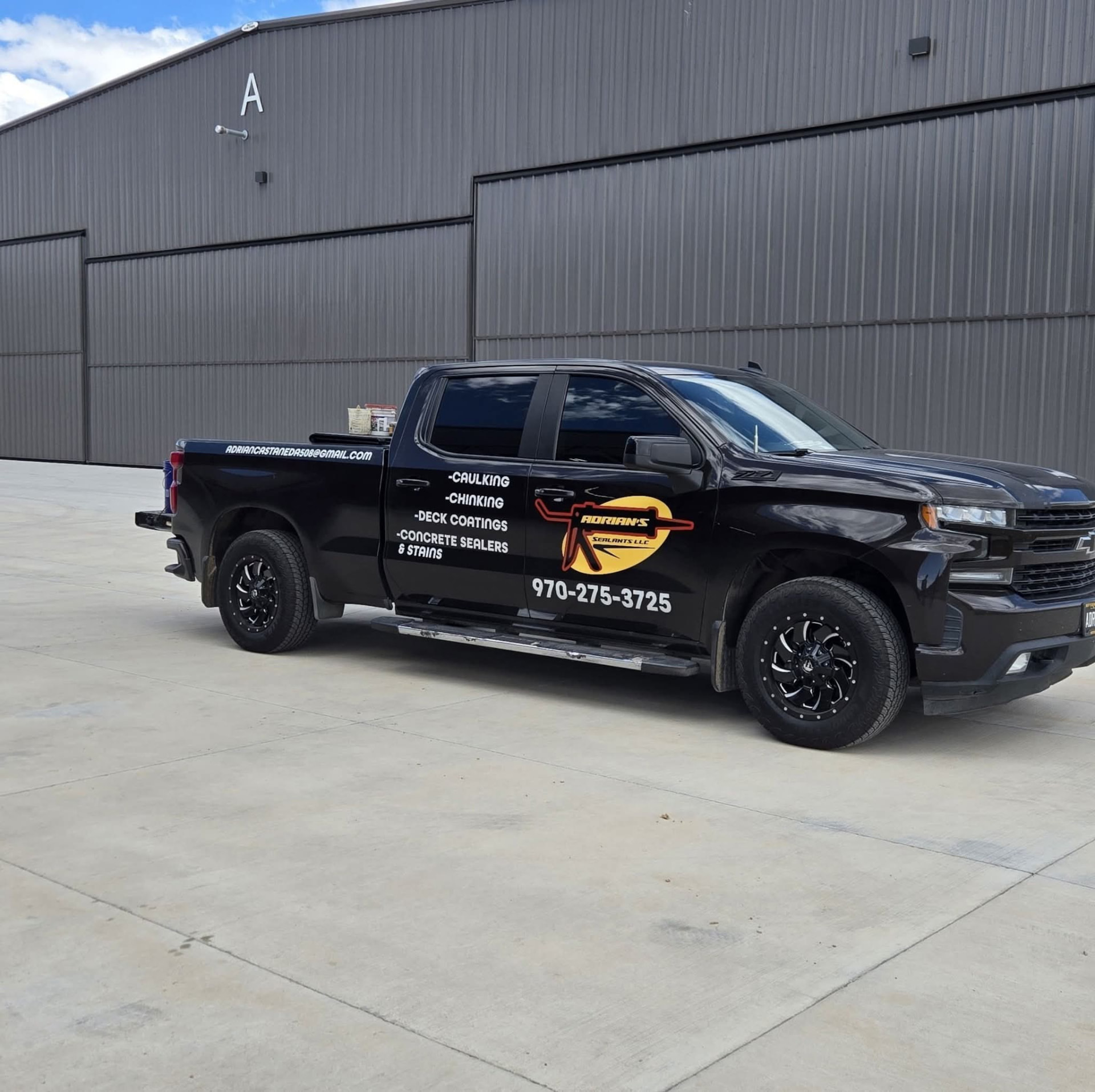 Adrian's Sealants work truck in Colorado