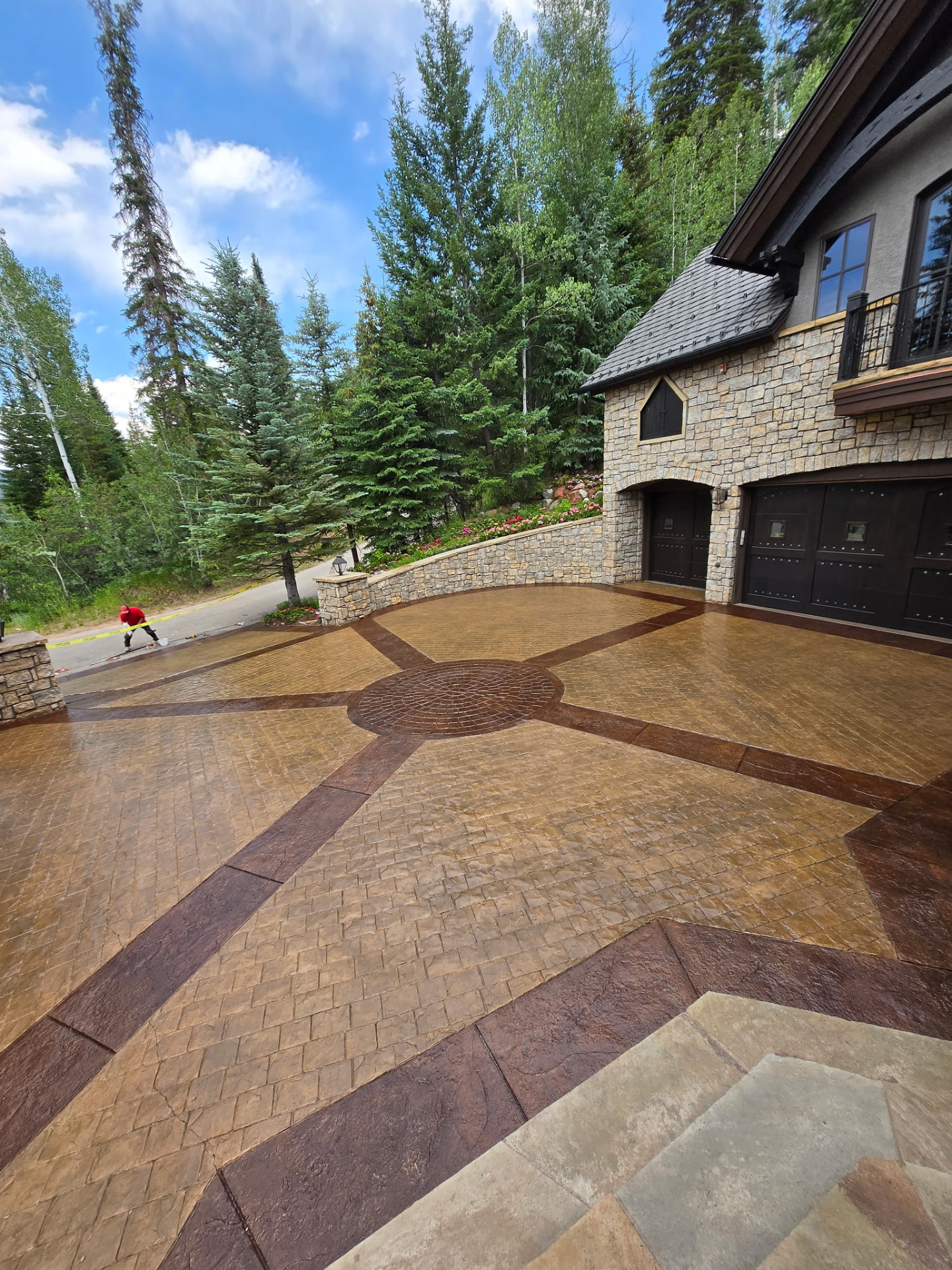 Finished sealed decorative concrete driveway at a mountain home